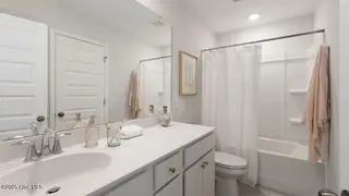 8681 Nashville Drive NW 1200, Calabash, NC 28467 – photo 14: crs_2443_pic_kensington_bath3_f2