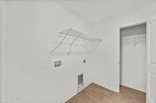 583 Summers Walk Road 108, Shallotte, NC 28470 — 3-bedroom home in Summers Walk, Shallotte, NC, photo 11 of 19: 23_laundry