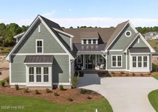 3452 St James Drive SE, Southport, NC 28461 – photo 1: 1-web-or-mls-DJI_20251006122050_0562_D