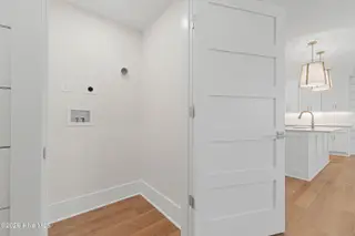 805 Mulberry Street Unit 113, Beaufort, NC 28516 – photo 24: Laundry Closet