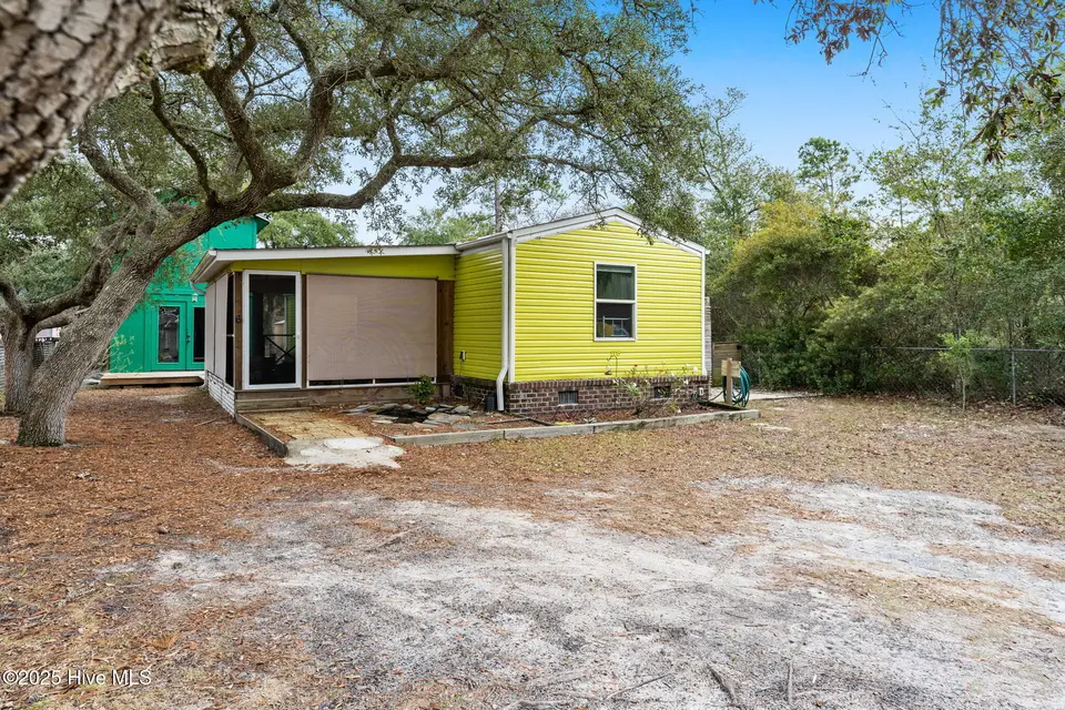 118 NE 67th Street, Oak Island, NC 28465 – photo 1 of 73: 1-web-or-mls-CAMMediaLLC.com 118-61