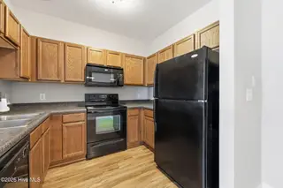 1924 Tara Court 202, Greenville, NC 27858 – photo 22: Kitchen 2