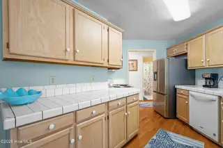 109 NE 1st Street, Oak Island, NC 28465 – photo 15: 33-web-or-mls-DSC03830