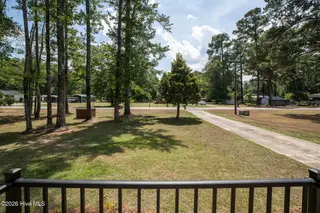 182 Crabapple Lane, Lake Waccamaw, NC 28450 – photo 11: Crabapple182-2fprchShaneL33A6348 copy