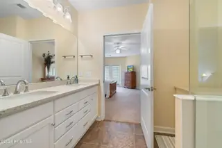 221 Woodlands Way Unit 21, Calabash, NC 28467 — 2-bedroom condo in Crow Creek, Calabash, NC, photo 16 of 39: Quartz Counters in Bathroom