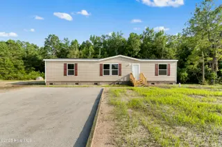 6795 Lewis Drive SE, Winnabow, NC 28479 – photo 1: 6795 Lewis Dr