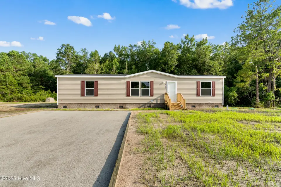 6795 Lewis Drive SE, Winnabow, NC 28479 – photo 1 of 25: 6795 Lewis Dr