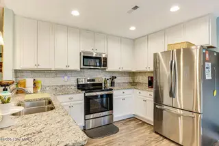 227 NE 38th Street, Oak Island, NC 28465 – photo 14: MIHBCYwA