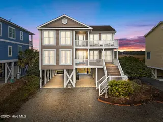 758 Ocean Boulevard W, Holden Beach, NC 28462 – photo 1: 1-web-or-mls-DJI_20241209132136_0839_D_1