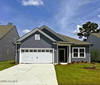 261 Eagle Claw Drive 4019, Carolina Shores, NC 28467 – photo 1: front- best