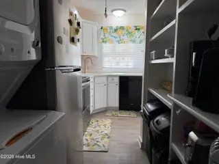 283 Salter Path Road 115, Pine Knoll Shores, NC 28512 – photo 2: Kitchen/Laundry