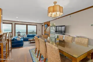 111 Dogwood Circle, Pine Knoll Shores, NC 28512 – photo 18: Dining room to living room