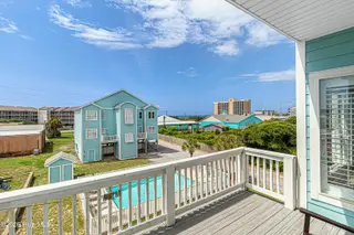 105 Beachwood Drive 1c Blue Water Condominiums, Atlantic Beach, NC 28512 – photo 11: Covered deck overlooking pool