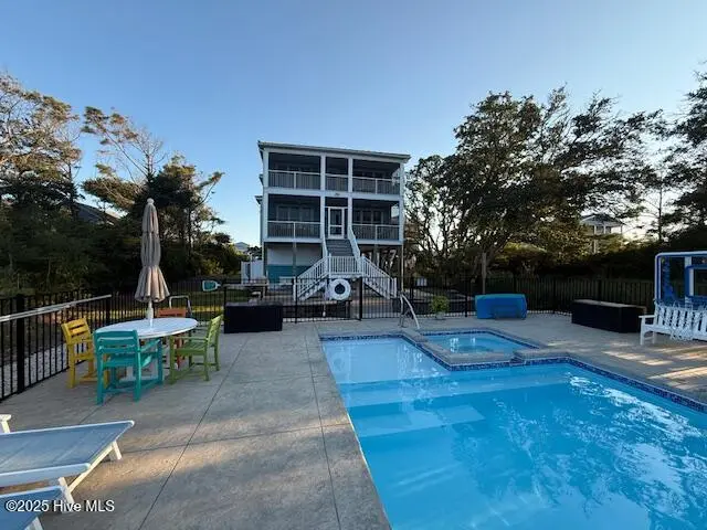 124 W Pelican Drive, Oak Island, NC 28465 – photo 1 of 66: IMG_2567