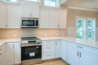 170 NE 31st Street, Oak Island, NC 28465 – photo 13: 170 NE 31st St Oak Island NC-large-018-0
