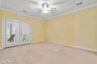 172 Clubhouse Road Apt 1, Sunset Beach, NC 28468 – photo 12: Primary bedroom