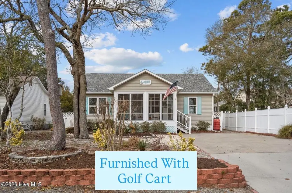 165 NE 5th Street, Oak Island, NC 28465 – photo 1 of 43: furnished with golf cart