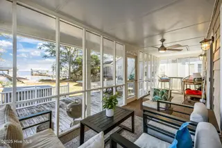 2517 Waccamaw Shores Road, Lake Waccamaw, NC 28450 – photo 5: Screened in porch
