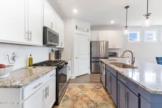 7788 Harrier Circle, Leland, NC 28451 – photo 10: 18-web-or-mls-IMG_9858