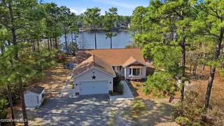 1281 Spring Lake Drive, Southport, NC 28461 — 3-bedroom home, Southport, NC, photo 1 of 46: Aerial Front View
