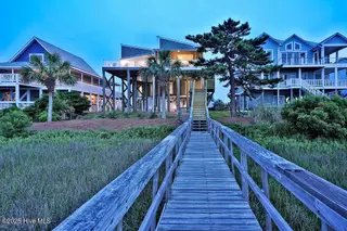 6008 W Beach Drive, Oak Island, NC 28465 – photo 7: 6008WestBeachDrive_twilight-7