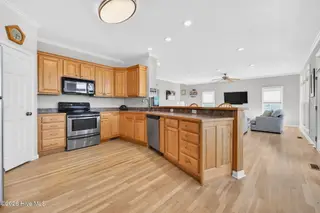 1616 E Dolphin Drive, Oak Island, NC 28465 – photo 19: Kahunaphoto.com-04226