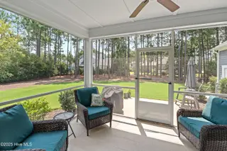 3997 Wyndmere Drive, Southport, NC 28461 – photo 20: Screened Patio Off of Dining Area