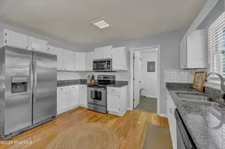 1004 E Oak Island Drive, Oak Island, NC 28465 – photo 12: 012_img_1089_339