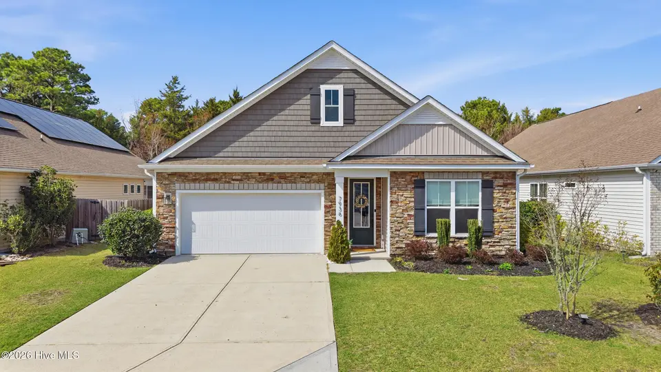 7936 Huron Drive, Wilmington, NC 28412 – photo 1 of 48: 32_dji_20260310145251_0002_d
