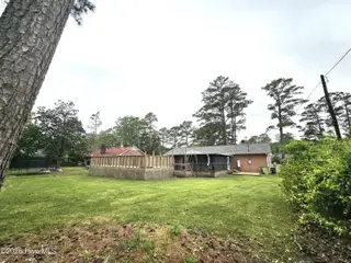 1018 Karen Drive, New Bern, NC 28562 – photo 18: 1018 Karen Back yard pool privacy and ba