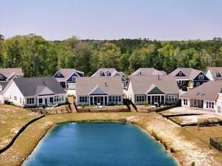 3347 Island Lakes Drive, Oak Island, NC 28461 – photo 2: dji_fly_20250414_135942_0175_17446544469