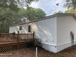 3360 Ashford Street SW, Shallotte, NC 28470 — 3-bedroom manufactured home in Chadwick Landing, Shallotte, NC, photo 2 of 19: New Rear