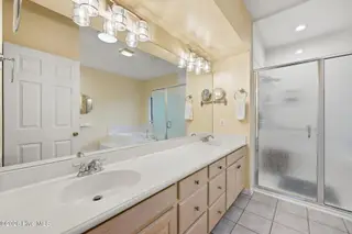908 Sawgrass Court, New Bern, NC 28560 – photo 20: Primary vanity