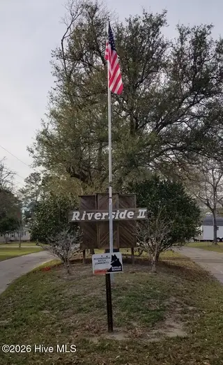232 Lake Drive SW, Supply, NC 28462 — 3-bedroom manufactured home in Riverside, Supply, NC, photo 21 of 36: Riverside II- Flag