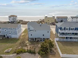 6618 W Beach Drive, Oak Island, NC 28465 – photo 15: 14-web-or-mls-DJI_20260304121837_0417_D