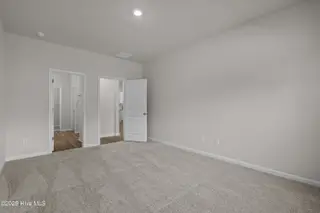 313 Parkington Lane 86a, Ocean Isle Beach, NC 28469 – photo 19: primary bedroom downstairs