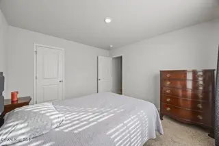 238 Poppleton Drive, Hampstead, NC 28443 – photo 8: m_8_bedroom