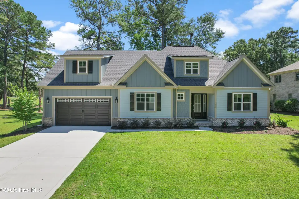272 Crooked Gulley Circle, Sunset Beach, NC 28468 – photo 1 of 56: Front of home