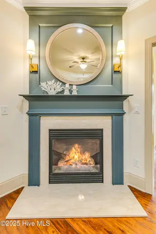 1166 Serotina Drive SE, Bolivia, NC 28422 – photo 14: Lovely Gas Log Fireplace