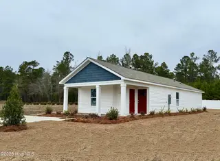 240 Ashworth Drive, Tabor City, NC 28463 – photo 17: Cottonwood lot 41 side