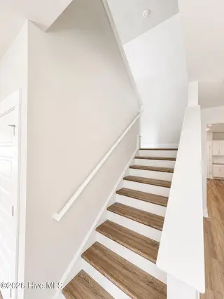 8611 Blue Haw Way Lot 124, Leland, NC 28451 — 5-bedroom home in Indigo Preserve, Leland, NC, photo 9 of 33: Hard Surface Stair Treads