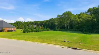 5818 Nobleman Court, Elm City, NC 27822 – photo 3: 12-web-or-mls-dji_fly_20260818_095850_02