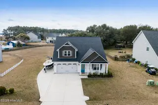 118 Camelot Drive, Holly Ridge, NC 28445 – photo 2: ChatGPT Image Jan 27, 2026, 12_19_11 PM