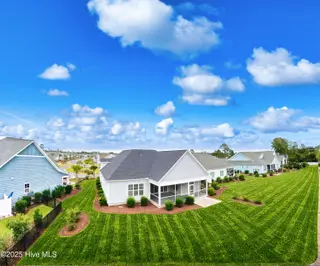 6391 Bryson Drive SW, Ocean Isle Beach, NC 28469 – photo 8: Backyard at daytime