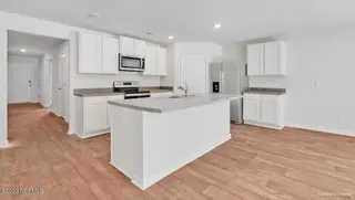 1237 Pampas Grass Drive Lot 467, Castle Hayne, NC 28429 – photo 17: Kitchen white cabinets