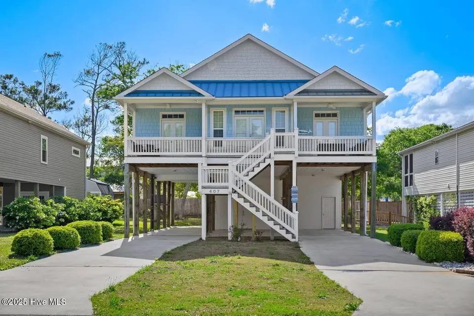 407 Womble Street, Oak Island, NC 28465 – photo 1 of 60: 407 Womble pict1
