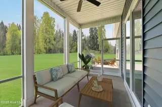2028 Oakton Drive, Southport, NC 28461 – photo 18: Screened Porch with optional patio 2