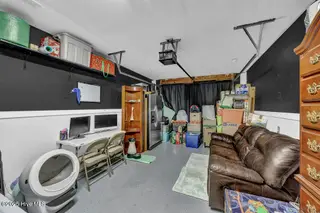 7368 Hazelstone Lane, Leland, NC 28451 — 3-bedroom home in Stoney Creek Plantation, Leland, NC, photo 24 of 33: Garage