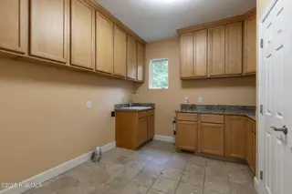2811 Deerfield Lane N, Wilson, NC 27896 — 5-bedroom home in Deerfield, Wilson, NC, photo 19 of 42: Laundry