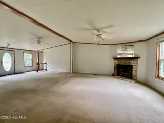 1225 Lynchs Corner Road, Elizabeth City, NC 27909 – photo 9: Living room 1